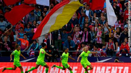 Barcelona striker Toni Duggan (R) celebrated during a Spanish league football match against Atletico.