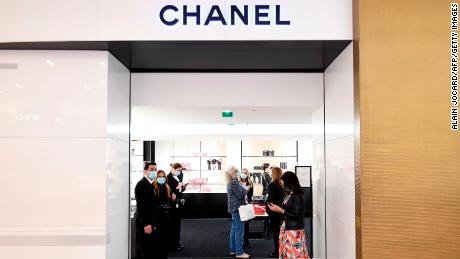Shop assistants who greeted customers at Chanel in Galeries Lafayette, the first day the department store opened in Paris in May.