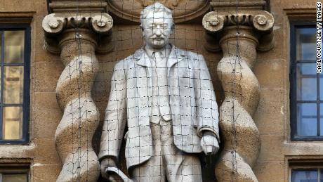 Who is Cecil Rhodes and why are British protesters protesting against his statue?