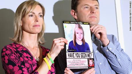 Kate and Gerry McCann hold an age-old police image of Madeleine during a press conference in London on the occasion of the 5th anniversary of her disappearance in May 2012.