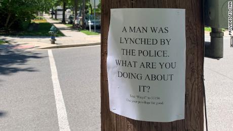 A man and two women were placing flyers in support of the Black Lives Matter when the man charged them, the statement said.