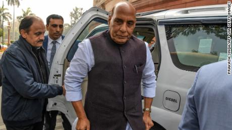 Indian Defense Minister Rajnath Singh (C) is coming to Parliament in New Delhi on 11 February.