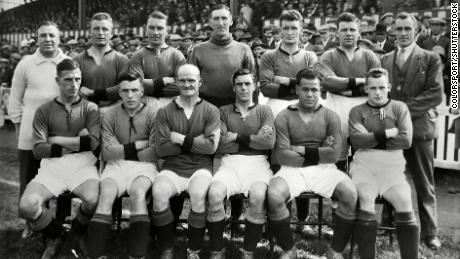 The Plymouth Argyle team posed for a photo during the 1927-8 season. Leslie is second from the right in the front row.