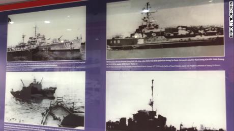 Photos in exhibitions inside the Paracel Islands Museum show ships involved in the conflict with China