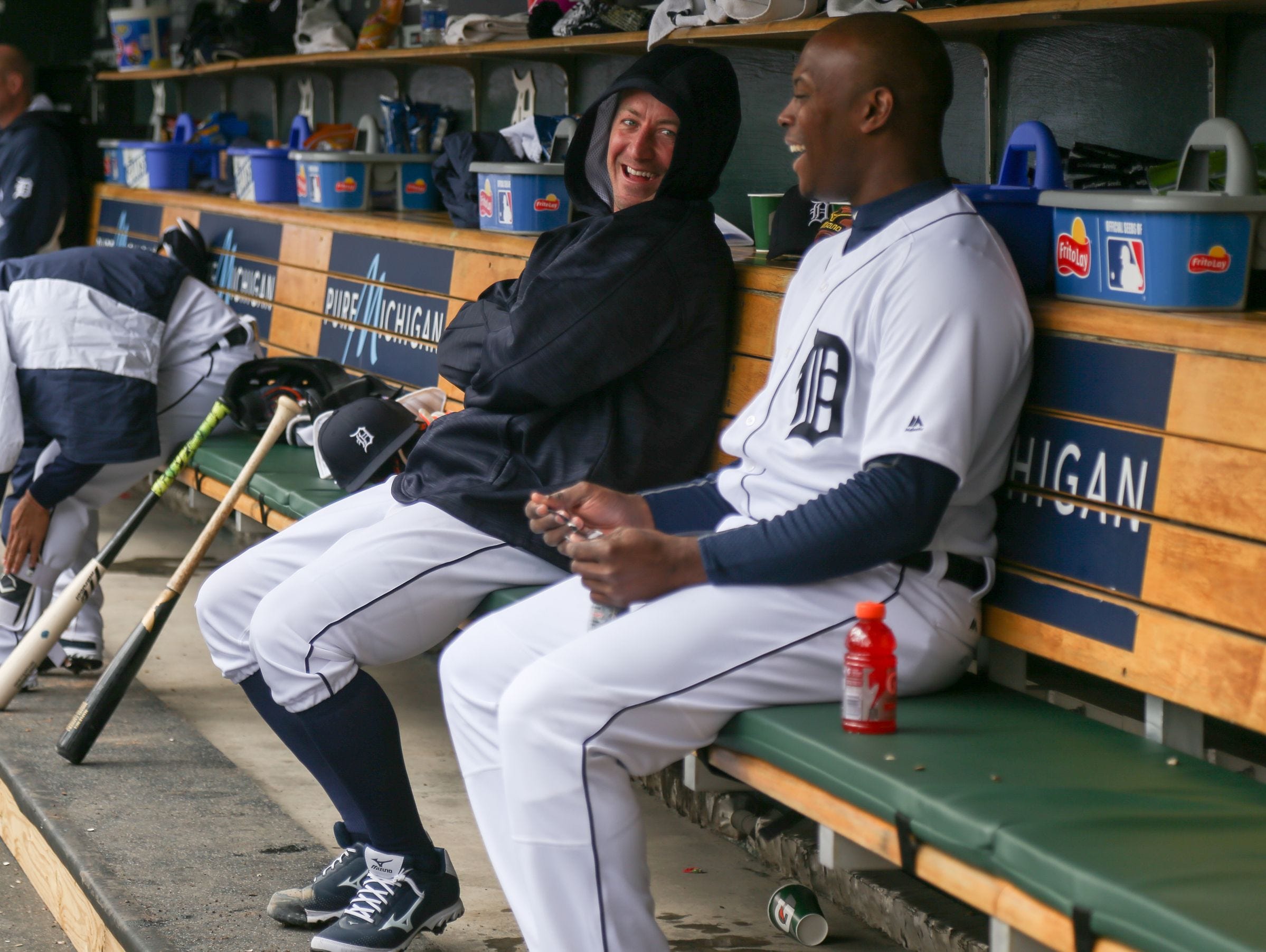 Detroit Tigers' Jordan Zimmermann has a laugh with Justin Upton on the bench during the Opening Day game against the New York Yankees at Comerica Park in Detroit on Friday, April 8, 2016.