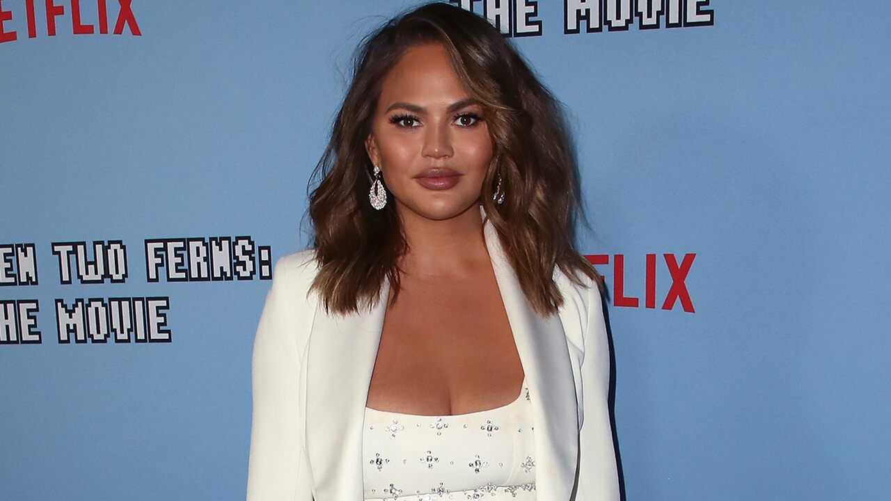 Chrissy Teigen posts video of breast implant removal scars because ‘nobody believes’ she had surgery