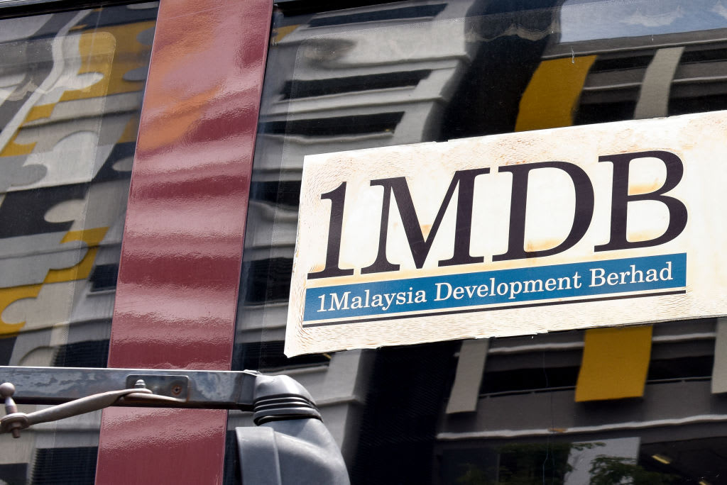 Goldman Sachs and Malaysia reach a settlement agreement over 1MDB scandal, sources say