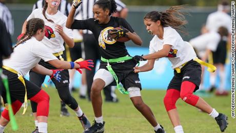 Players participate in the first day of games at the NFL Flag Football Championship.