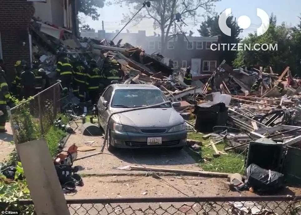 Baltimore police scanners said they were responding to a 'mass casualty' that impacted a three block radius and 'completely destroyed' three homes