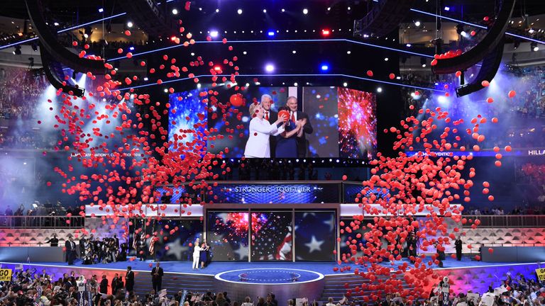 Balloons come down on Democratic presidential nominee Hillary Clinton and running mate Tim Kaine at the end of the fourth and final night of the Democratic National Convention at Wells Fargo Center on July 28, 2016 in Philadelphia, Pennsylvania.   / AFP / SAUL LOEB        (Photo credit should read SAUL LOEB/AFP via Getty Images)