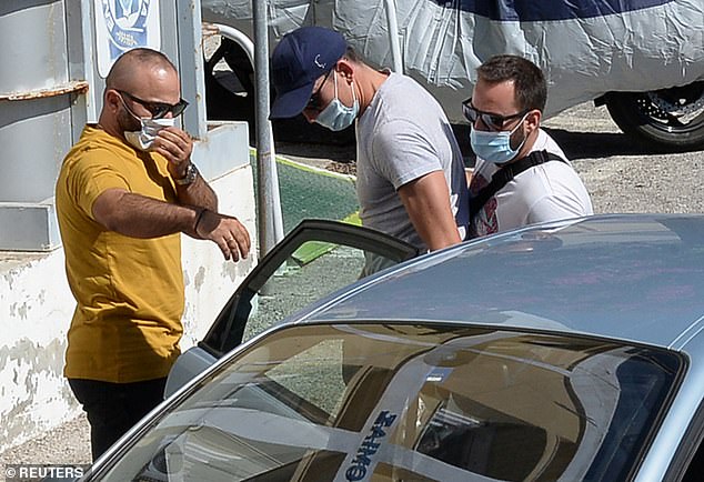 Maguire was spotted being taken into a Greek police station after being arrested in Mykonos