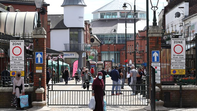 People shopping in Oldham, where there has been a rise in infections