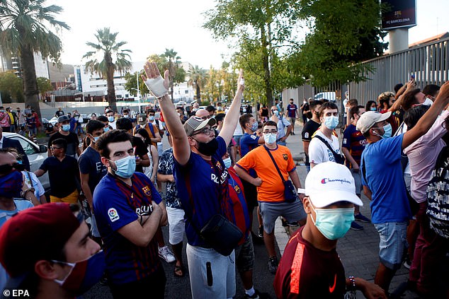 Barcelona supporters gathered around the Nou Camp to protest against their under-fire board