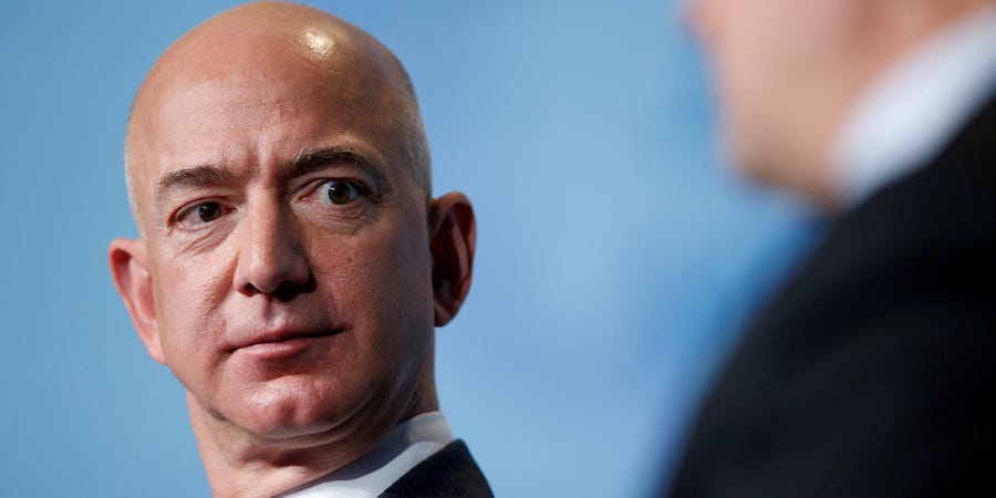 Amazon protesters set up guillotine exterior Jeff Bezos’ dwelling