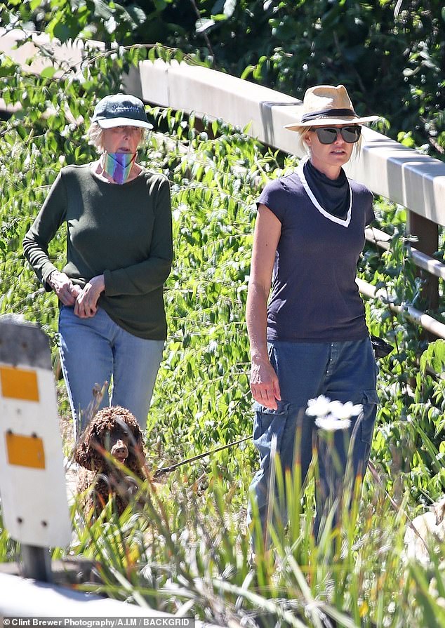 The latest: Portia de Rossi, 47, who's the wife of talk show host Ellen DeGeneres, 62, was seen hiking with her mother Margaret and her dogs Sunday in Santa Barbara, California