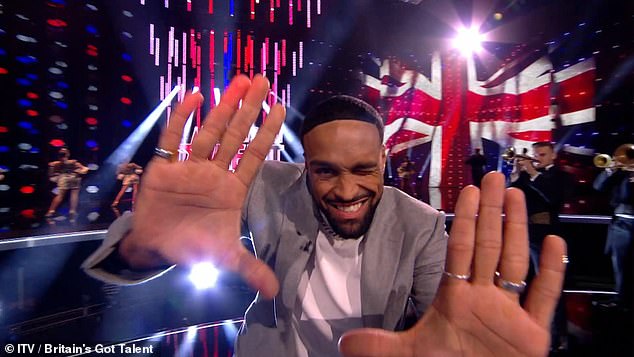 Smooth moves: BGT winner Ashley Banjo fills the chair of jury Simon Cowell, who is currently recovering from a strange bike accident in Los Angeles