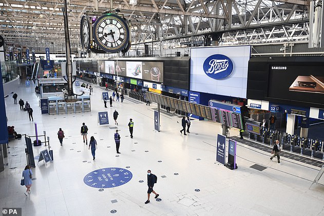 The lobby at London's Waterloo Station - one of the capital's busiest stations - during rush hour, 2 September 2020