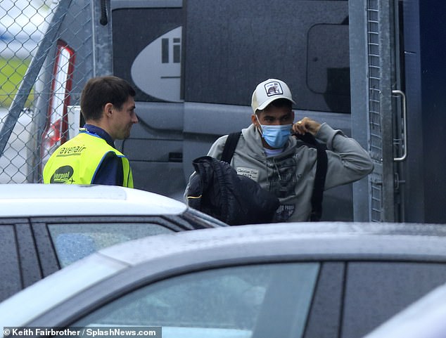 Alan was pictured arriving in Liverpool on Wednesday afternoon to close the transfer to Everton