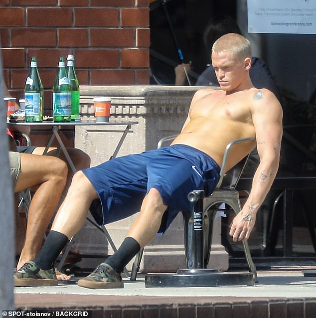 Cody Simpson looks sad wearing a T-shirt in Venice