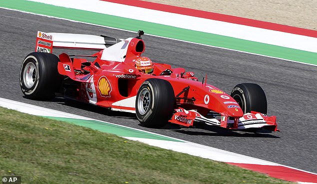 Mick Schumacher drives his father's Ferrari F2004 at a stage show at the Tuscan Grand Prix