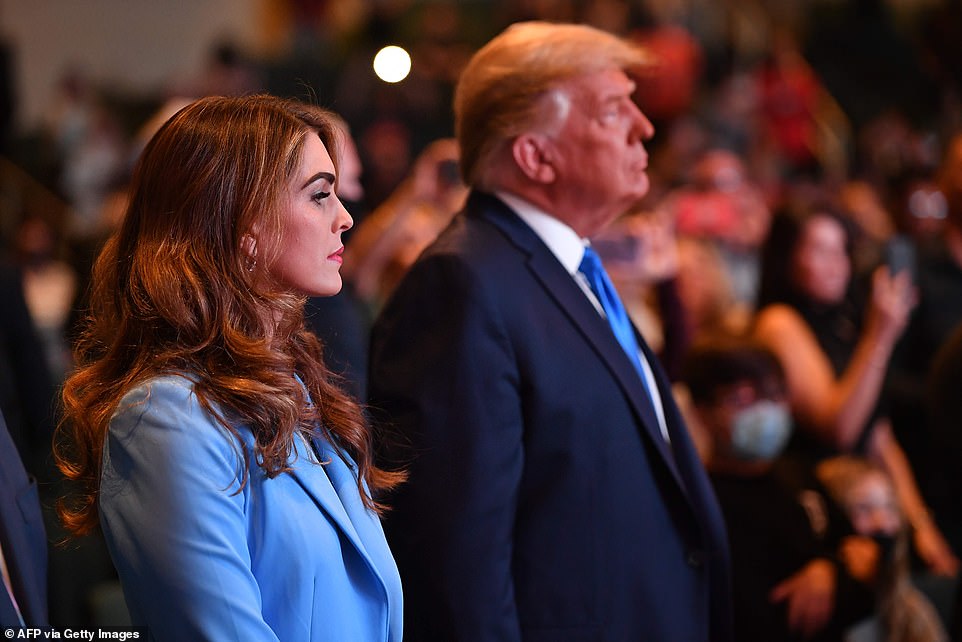 President Donald Trump (right) attended services with Hope Hicks (left), among others