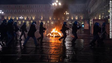 Clashes between protesters and police in northern Italy as anger over COVID-19 restrictions mounts