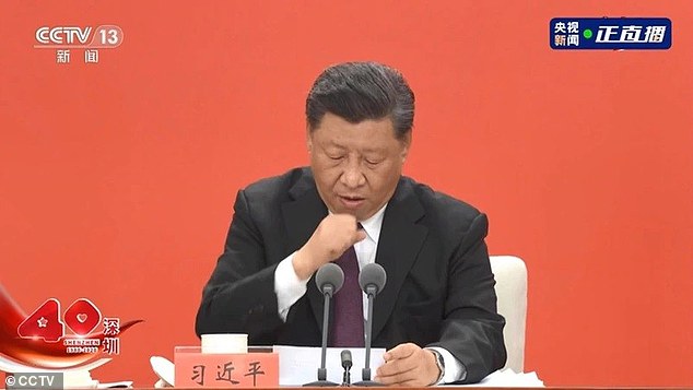 Xi Jinping was caught coughing repeatedly during the closing minutes of a speech he gave to the Party Faithful in Shenzhen on Wednesday.