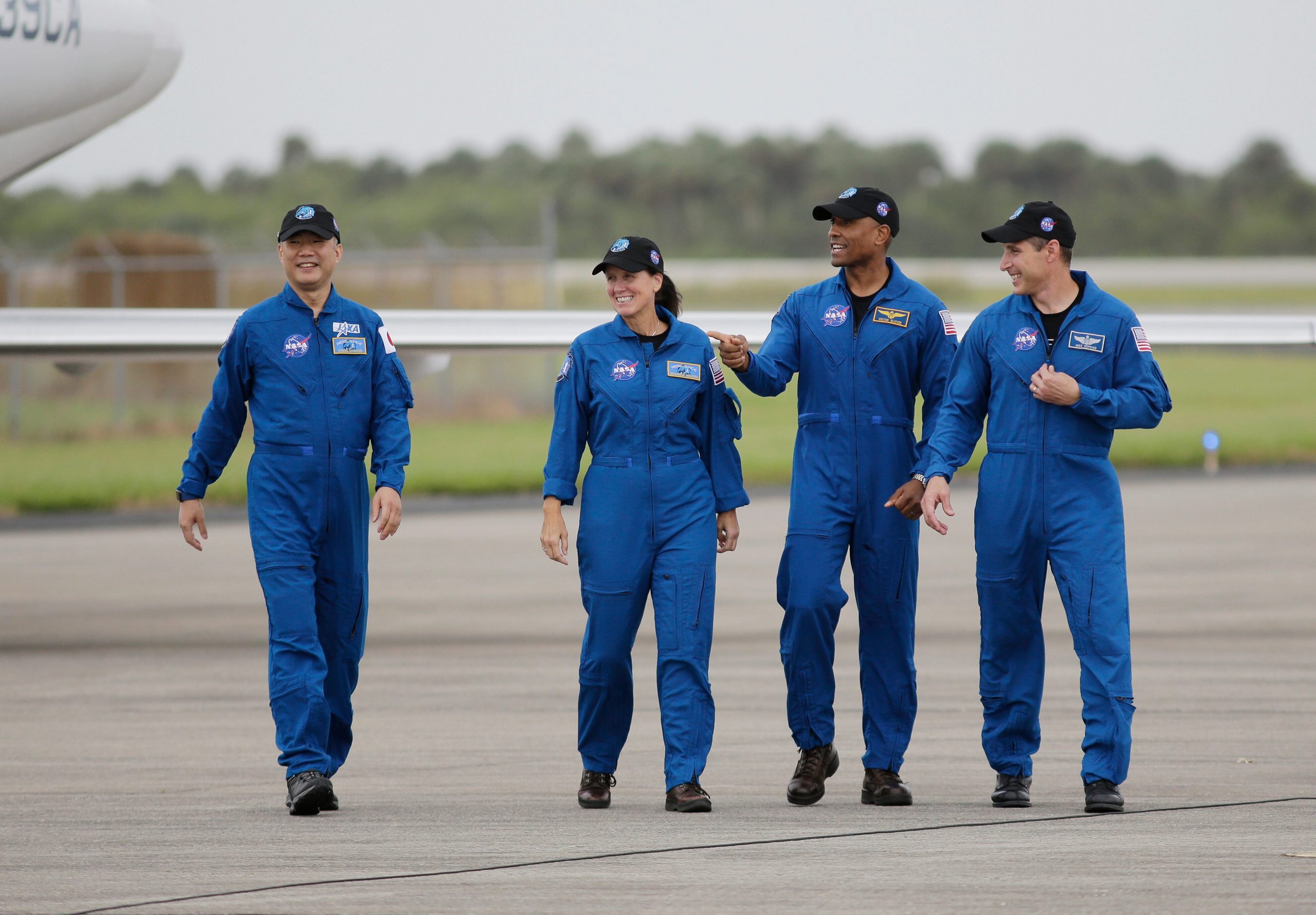 Astronauts head to the launch site of the SpaceX flight