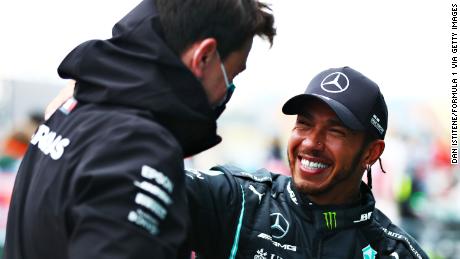 Hamilton with the head of the Mercedes Toto Wolf. 