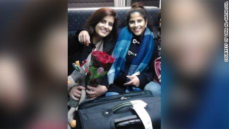 Lina Al-Hathloul and her sister Loujain pose for an undated photo on a train from Brussels. 