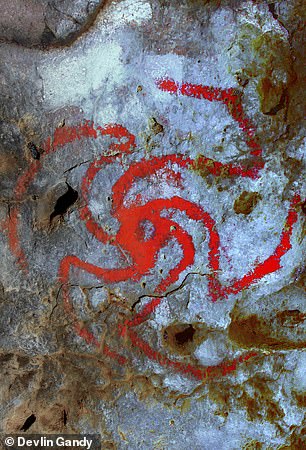 Researchers from the United Kingdom and the United States found that a spiral art form (pictured) drawn on a cave wall south of Bakersfield resembles an intoxicating flower known as 