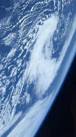 The short clip, which was shared on Twitter, is only a few seconds long but shows the curve of our planet, the amazing blue sky and clouds of objects dotted in the atmosphere.