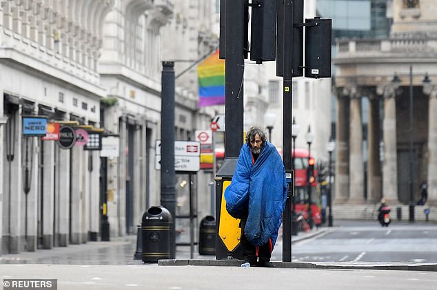 Homelessness charities said many families were `` severely affected '' by the coronavirus crisis - even before COVID-19 reached its peak.  Pictured: a homeless person in London in April