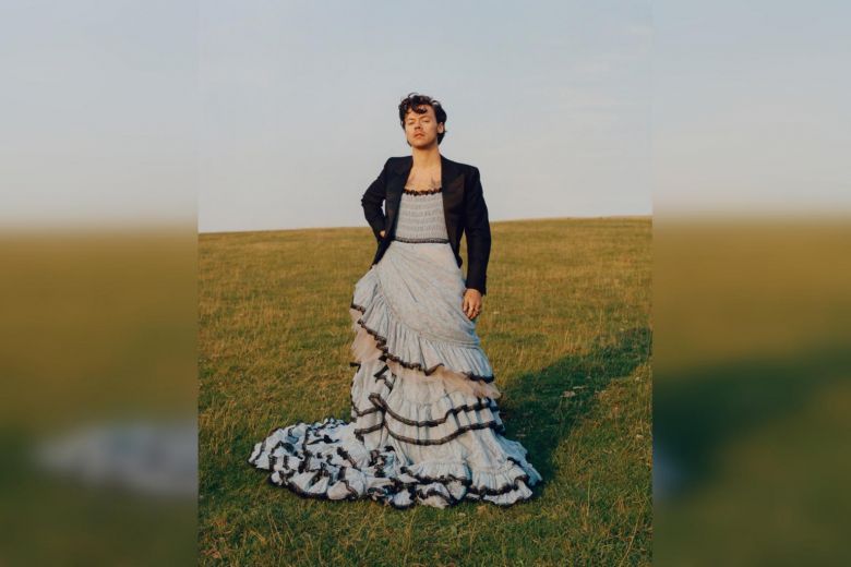 Singer Harry Styles first man to be on the cover of Vogue;  Wearing a ball gown