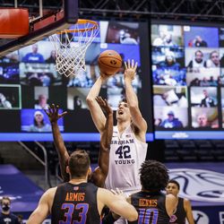 BYU's Richard Harward climbs in a shot against Boise State at the Marriott Center in Provo, Utah on December 9, 2020.