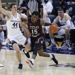 BYU goalkeeper Connor Harding (44) defended Texas South striker Justin Hopkins (15) during the Cougars' 87-71 victory at the Marriott Center in Provo on Monday December 21, 2020.
