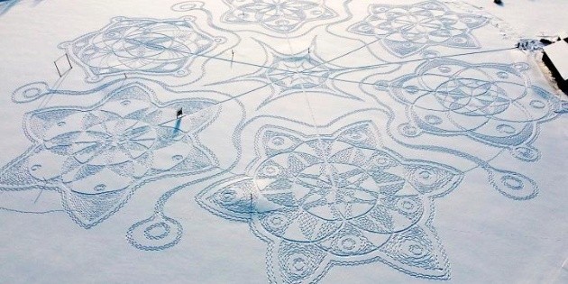 Stepping on the ice, they create artwork in Finland