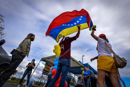 Venezuelans in Doral Central Park, in Doral, Miami-Dade, Florida, celebrate the TPS announcement