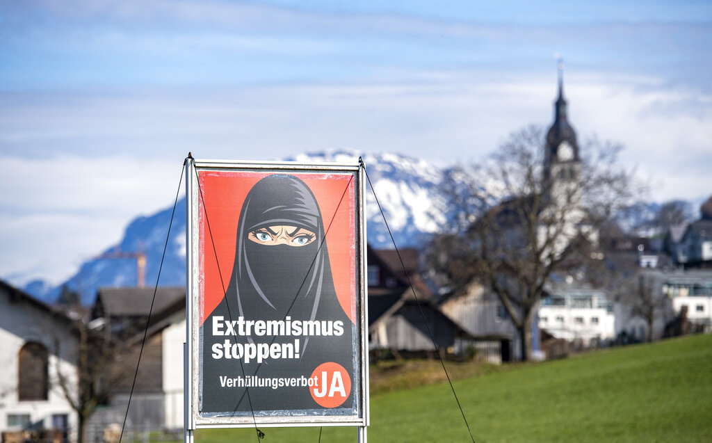 Switzerland approves banning the burqa and masking the face in public places