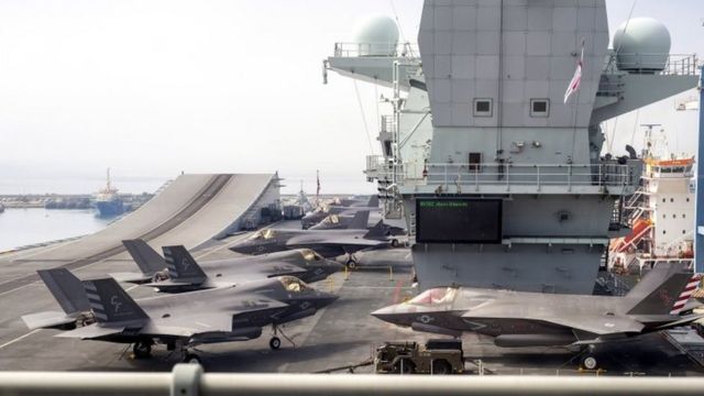 Lockheed Martin's F-35B Lightning II combat aircraft of the US Navy's 211th Fighter Squadron (VMFA 211) on the flight deck of HMS Queen Elizabeth in the port of Limassol, Cyprus, July 1, 2021.