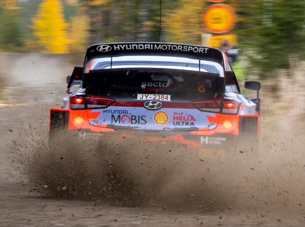 Ott Tanak slides over the cobblestones of Rally Finland in his Hyundai