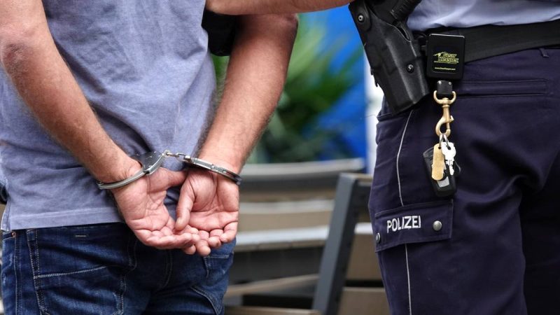 Police arrest a group of young men

