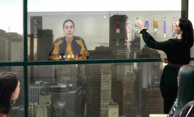 Video conferencing from the office window?  “It’s not just glass. It’s transparent OLED.”