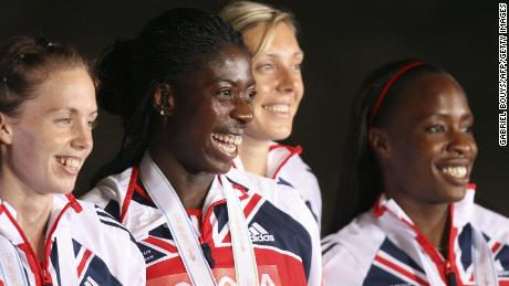 Britain’s Lee Mcconnell, Christine Ohuruogu, Nicola Sanders and Okoro celebrate on the podium after the women’s 4x400m final in the relay on September 2, 2007, at the 11th World Athletics Championships, Osaka. The United States won ahead of Jamaica and Britain.