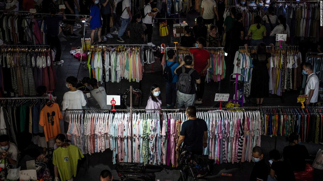 Can street vendors save China from a business crisis? Beijing seems divided