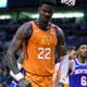 Phoenix Suns center Deandre Ayton (22) reacts after blocking a shot by New York Knicks forward Julius Randle in the first half during an NBA basketball game, Friday, Jan. 3, 2020, in Phoenix. (AP Photo/Rick Scuteri)