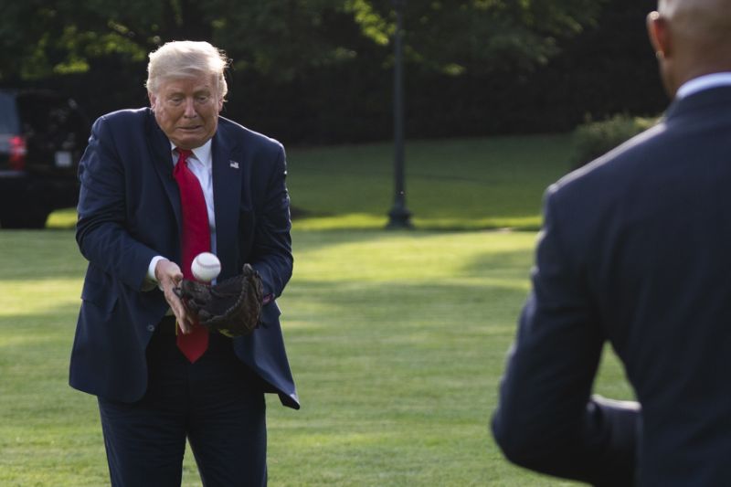 Donald Trump reportedly took some liberties with his announcement to throw out a pitch at a Yankees-Red Sox game. (AP Photo/Evan Vucci)