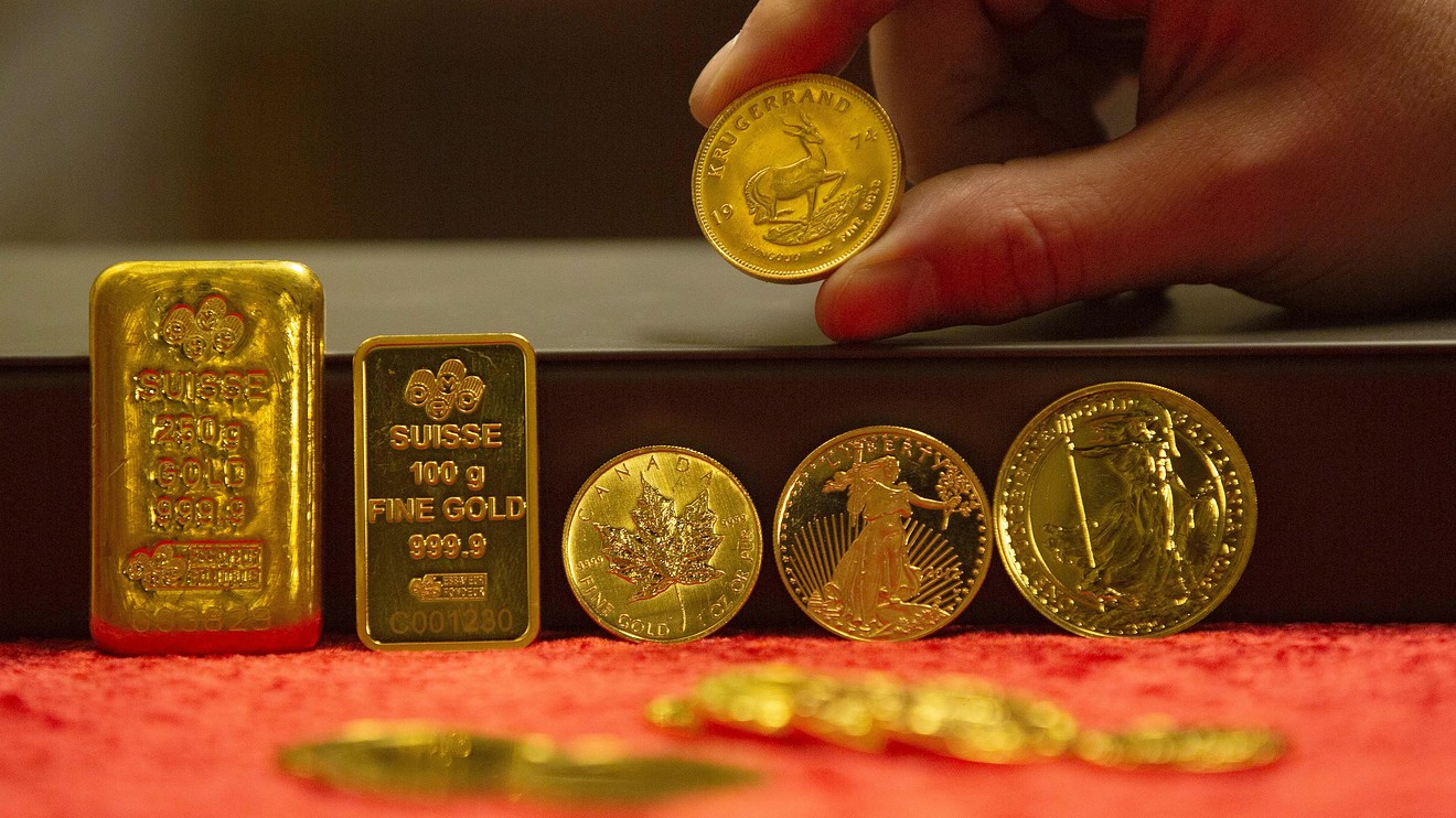 Gold futures reverse after surging to history highs