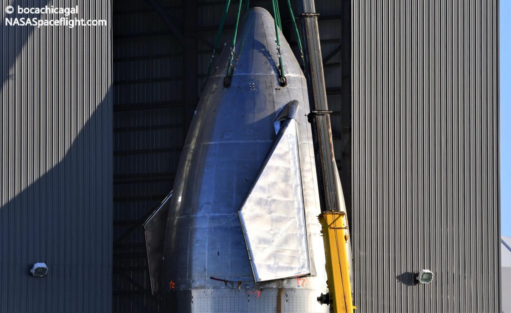 SpaceX Starship is used to mount a nosecone after a historic static fire