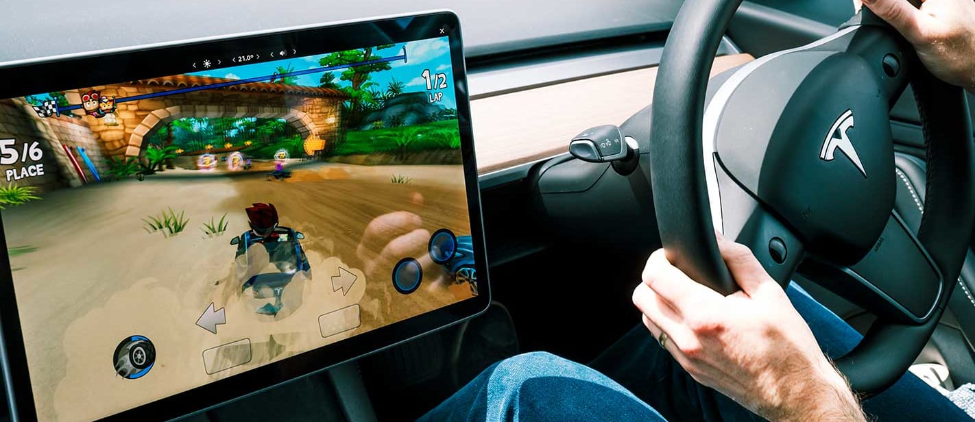 Tesla under investigation for driving video games